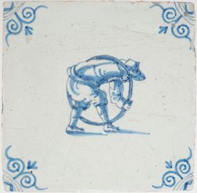 Antique Delft tile with a child playing with the hoop, 17th century