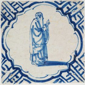 Antique Delft tile with a priest, 17th century