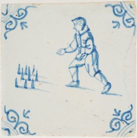 Antique Delft tile in blue with a child playing a game of nine-pin bowling, 17th century