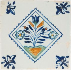 Antique Delft tile with a tulip and flowers, 17th century