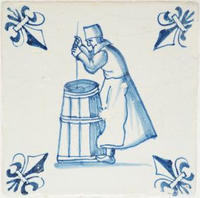 Antique Delft tile with a person churning butter, 17th century