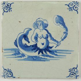 Antique Delft tile with a mermaid holding a torch, 17th century