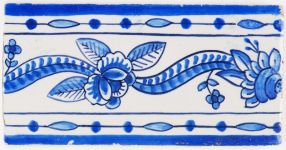 Antique Delft border tile in blue known as the Rose Ribbon, 19th century