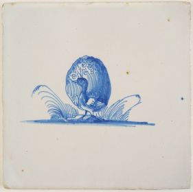 Antique Delft tile in blue with a peacock stretching its tail feathers, 18th century