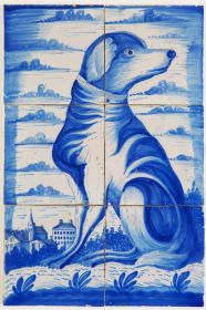 Antique Delft tile mural in blue with a dog infront of a Dutch city scene, 19th century