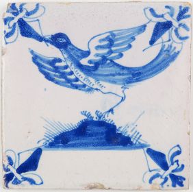Antique Dutch Delft tile in blue with a large bird in flight, late 17th or early 18th century