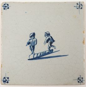 Antique Delft child's play tile in blue with two children playing a game of hopscotch, 18th century