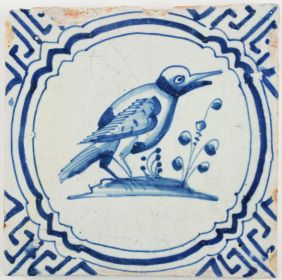 Antique Dutch Delft tile with a kingfisher in blue, 17th century