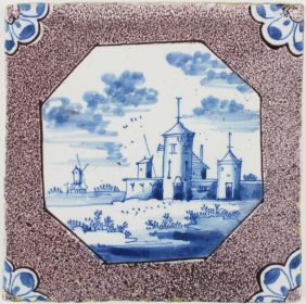 Antique Delft tile with a Dutch landscape in blue with a manganese border, 18th century