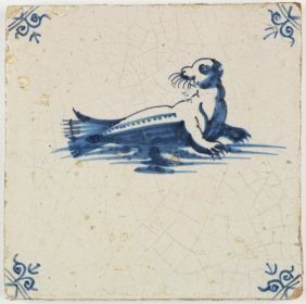 Antique Dutch Delft tile in blue with a seal, 17th century