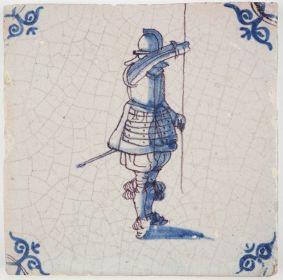 Antique Delft tile with a pikeman in bue and manganese, 17th century