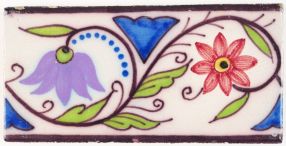 Antique polychrome Delft border tile with a tulip and a chalice - type II, 19th century