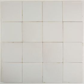 Plain white antique Dutch Delft tiles dating from around 1900
