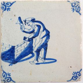 Antique Delft tile with a mason, 17th century
