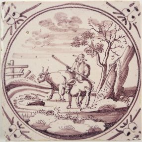 Antique Delft tile with a farmer, 18th century