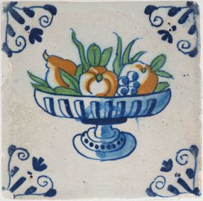 Antique Delft tile with a fruit bowl, 17th century