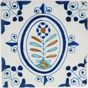 Antique Delft tile with a flower, 17th century