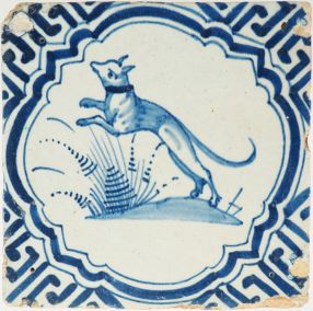 Antique Delft tile with a dog, 17th century