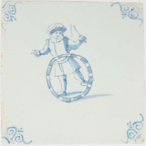 Antique Delft tile with a child playing with a hoop, 17th century