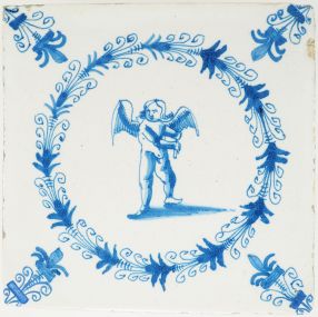 Antique Delft tile c.1660 showing a blue Cupid with flute in aigrette wreath, likely made in Harlingen