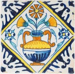 Antique Delft tile with flowerpot in diamond square and reserve-painted corners, 17th century 