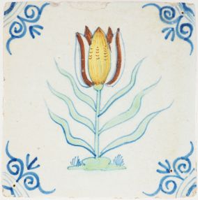 Antique Delft tile with a yellow tulip, 17th century