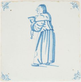 Antique Delft tile with priest holding a cross and book, 17th century