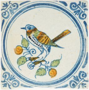 Antique Delft tile with polychrome bird on fruit branch, 17th century