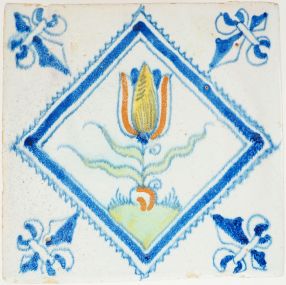 Antique Delft tile with polychrome tulip in diamond square, 17th century