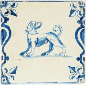 Antique Delft tile of a dog turning its head, 17th century
