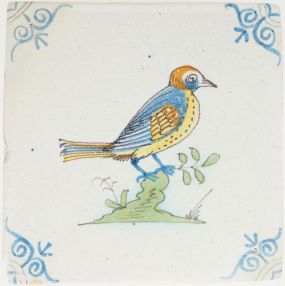 Antique Delft tile with bird on branch, 17th century