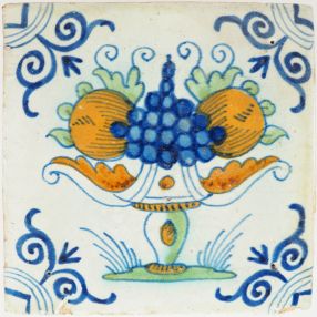 Antique Delft tile with polychrome fruit bowl, 17th century