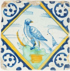 Antique Delft tile with bird in polychrome, 17th century