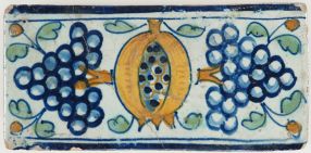 Antique Delft border tile with pomegranates & grapes, 17th century