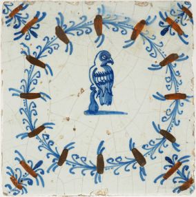 Antique Delft polychrome tile with a buzzard perched on a rod, 17th century