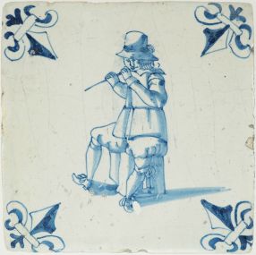 Antique Delft tile with blue flute player, 17th century