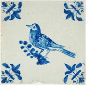 Antique Delft wall tile in blue with a bird on a branch, 17th century