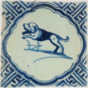 Antique Delft tile with a dog, 17th century
