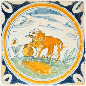 Antique Delft circle tile with lion resting its paw on a globe, 17th century
