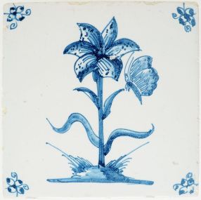 Antique Delft tile with an iris and butterfly in blue, 18th century