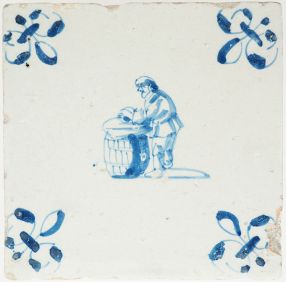 17th-century Dutch tile showing a paint maker standing on a wooden barrel, circa 1650.