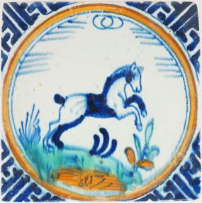 Antique Rotterdam Delft crown tile with a polychrome rearing horse, 17th century