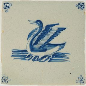 Antique 17th-century Delft tile depicting a blue swan spreading its wings, 17th century