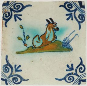 Antique 17th-century Delft tile depicting a resting goat, 17th century