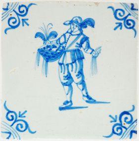 Antique 17th-century Delft tile with a peddler, 17th century