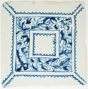 Rare antique 17th-century Delft mirror tile with blue a fogli foliate decoration, 17th century