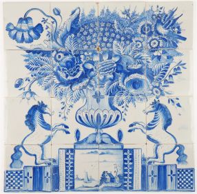 Antique Delft tile mural in blue with a richly decorated flower vase and two prancing horses, 19th century