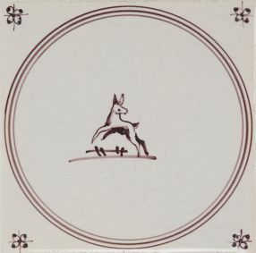 Hand-painted Delft tiles sample with Springer in circle frame, P-17, decorated with spider corner motif and enhanced with pinholes and a crackled finish