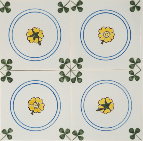 Classic hand-painted Delft tiles with colourful buttercups - decorated with clover corner motif