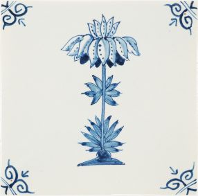 Hand-painted Delft tiles sample with Flower, painted in blue and decorated with ox-head corner motifs
